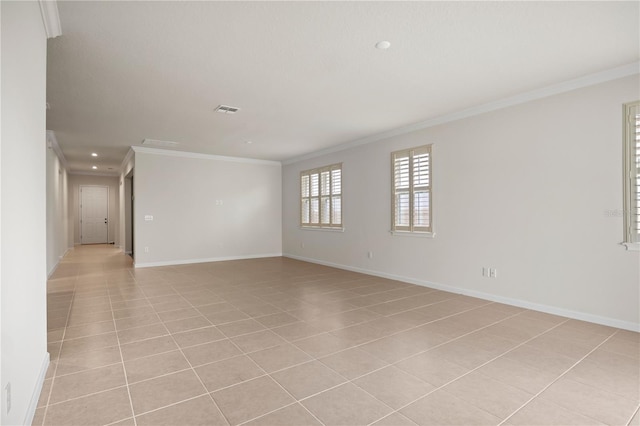 2477 Water Willow Dr, Lutz, FL 33558 - spare room with baseboards, crown molding, light tile patterned flooring, and visible vents
