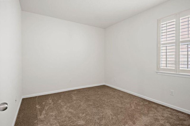 2477 Water Willow Dr, Lutz, FL 33558 - carpeted empty room with baseboards