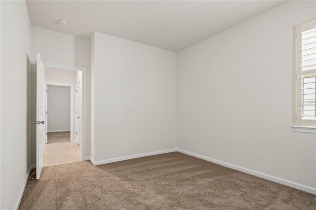 2477 Water Willow Dr, Lutz, FL 33558 - unfurnished room with baseboards and carpet