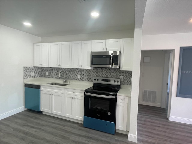 kitchen with range with electric cooktop, stainless steel microwave, a sink, visible vents, and dishwashing machine