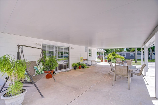 view of patio featuring outdoor dining space