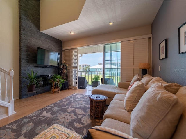 living room featuring recessed lighting and wood finished floors