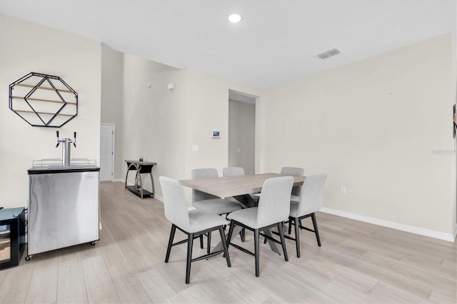 7721 Twin Leaf Ter, Parrish, FL 34219 - dining area featuring recessed lighting, baseboards, visible vents, and light wood-style floors