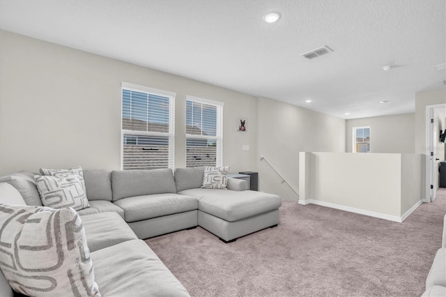 7721 Twin Leaf Ter, Parrish, FL 34219 - living area featuring carpet flooring, recessed lighting, baseboards, and visible vents