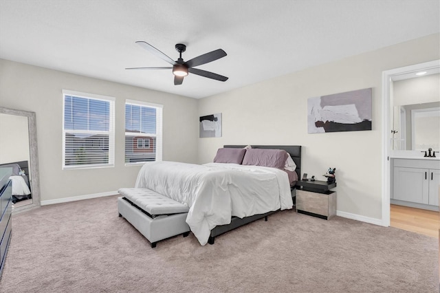 7721 Twin Leaf Ter, Parrish, FL 34219 - bedroom featuring light colored carpet, a sink, baseboards, and ceiling fan