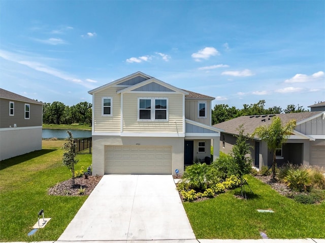 7721 Twin Leaf Ter, Parrish, FL 34219 - traditional home with board and batten siding, driveway, a front yard, a water view, and an attached garage