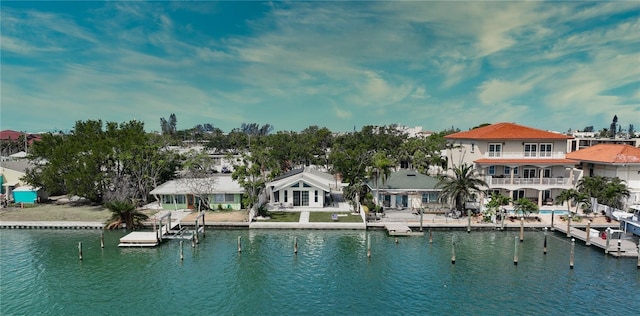 8635 Boca Ciega Dr, St Pete Beach, FL 33706 - view of pool with a water view and a dock