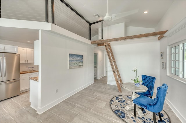 8635 Boca Ciega Dr, St Pete Beach, FL 33706 - unfurnished room with visible vents, baseboards, high vaulted ceiling, recessed lighting, and a ceiling fan