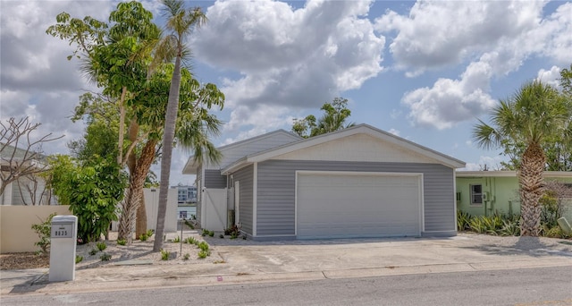 8635 Boca Ciega Dr, St Pete Beach, FL 33706 - view of front of property featuring driveway