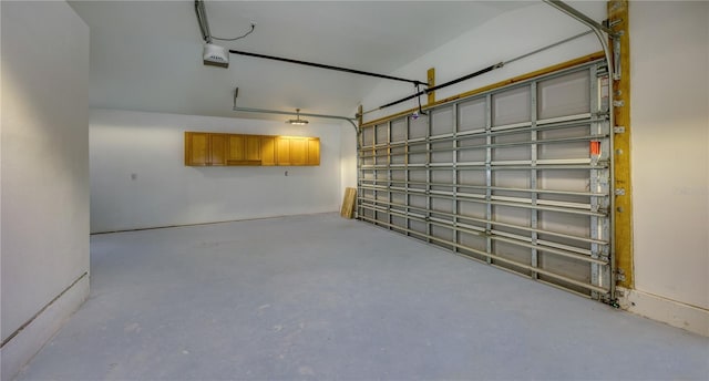 8635 Boca Ciega Dr, St Pete Beach, FL 33706 - garage featuring a garage door opener