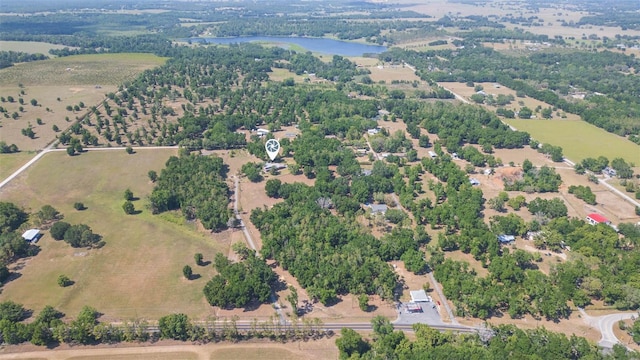 bird's eye view with a water view and a rural view
