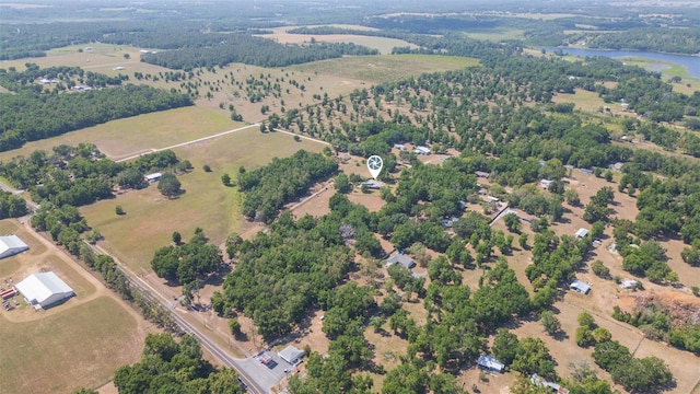 bird's eye view with a water view and a rural view