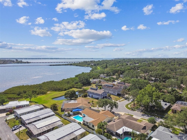 bird's eye view featuring a residential view and a water view