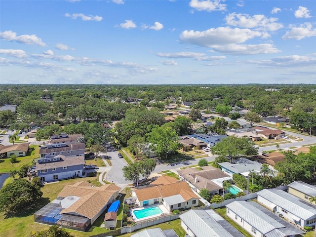 birds eye view of property with a residential view