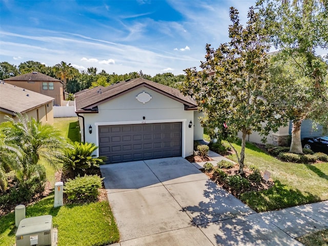 4516 Savannah Holly Pl, Riverview, FL 33578 - ranch-style house featuring stucco siding, a front lawn, driveway, and a garage