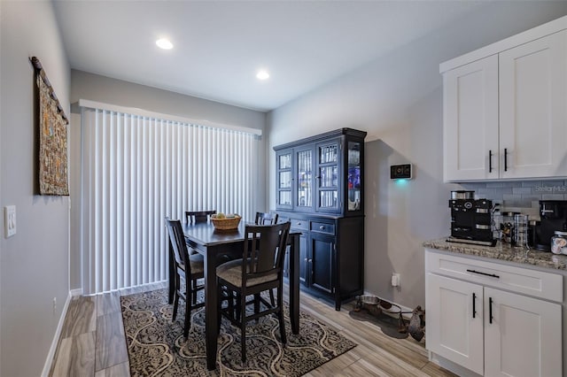 4516 Savannah Holly Pl, Riverview, FL 33578 - dining space featuring light wood-style flooring, baseboards, and recessed lighting