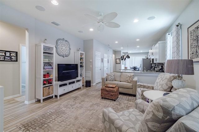 4516 Savannah Holly Pl, Riverview, FL 33578 - living area featuring ceiling fan, light wood-style flooring, baseboards, visible vents, and recessed lighting