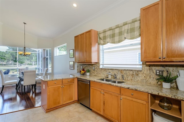 kitchen featuring tasteful backsplash, ornamental molding, dishwasher, a sink, and a peninsula