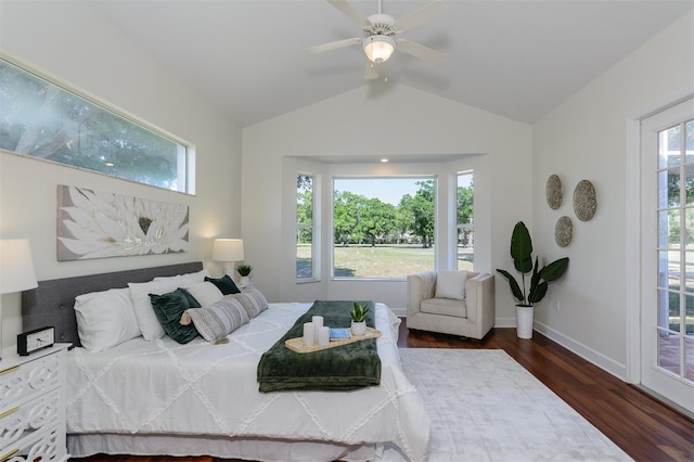 bedroom featuring baseboards, wood finished floors, ceiling fan, and lofted ceiling