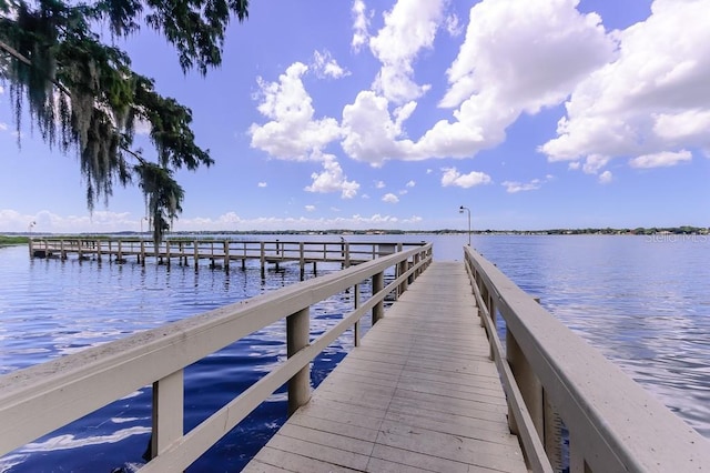 view of dock with a water view
