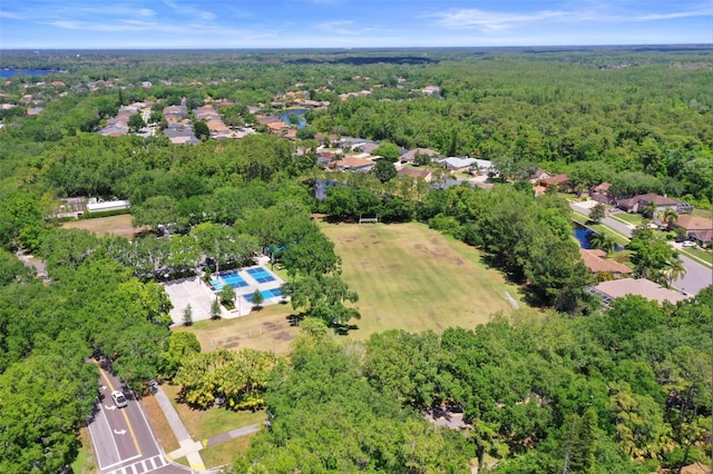 aerial view featuring a view of trees