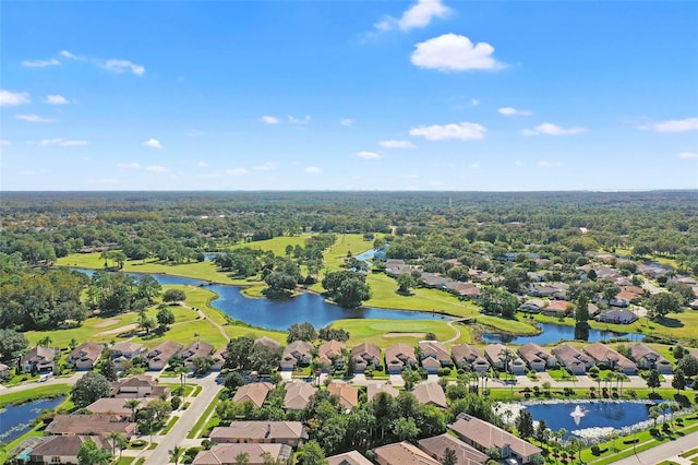 aerial view featuring a residential view, a water view, and golf course view