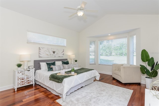 3964 Silk Oak Ln, Palm Harbor, FL 34685 - bedroom featuring vaulted ceiling, wood finished floors, a ceiling fan, and baseboards