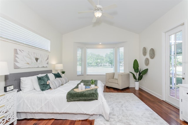 3964 Silk Oak Ln, Palm Harbor, FL 34685 - bedroom featuring multiple windows, lofted ceiling, access to outside, wood finished floors, and a ceiling fan