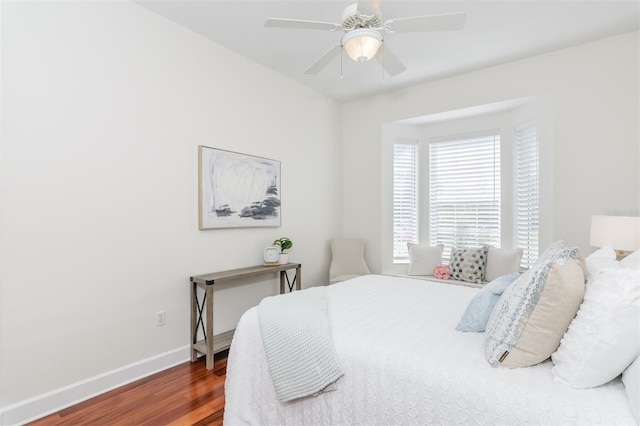 3964 Silk Oak Ln, Palm Harbor, FL 34685 - bedroom featuring wood finished floors, baseboards, and ceiling fan