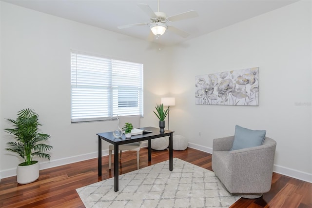 3964 Silk Oak Ln, Palm Harbor, FL 34685 - office space featuring a ceiling fan, wood finished floors, and baseboards