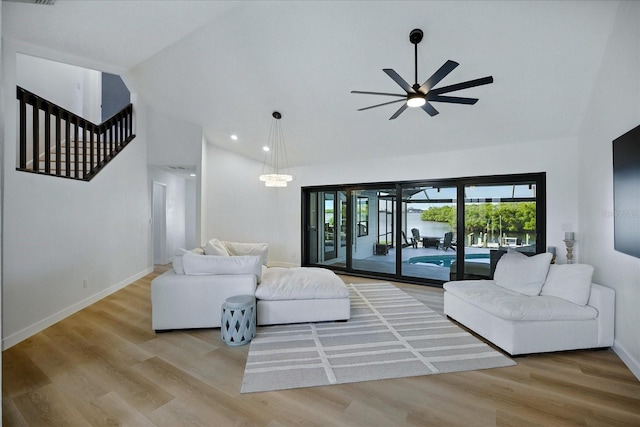 6627 Dolphin Cove Dr, Apollo Beach, FL 33572 - living area featuring high vaulted ceiling, ceiling fan, wood finished floors, and recessed lighting