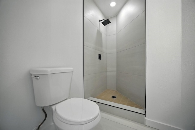 6627 Dolphin Cove Dr, Apollo Beach, FL 33572 - bathroom featuring a tile shower and toilet