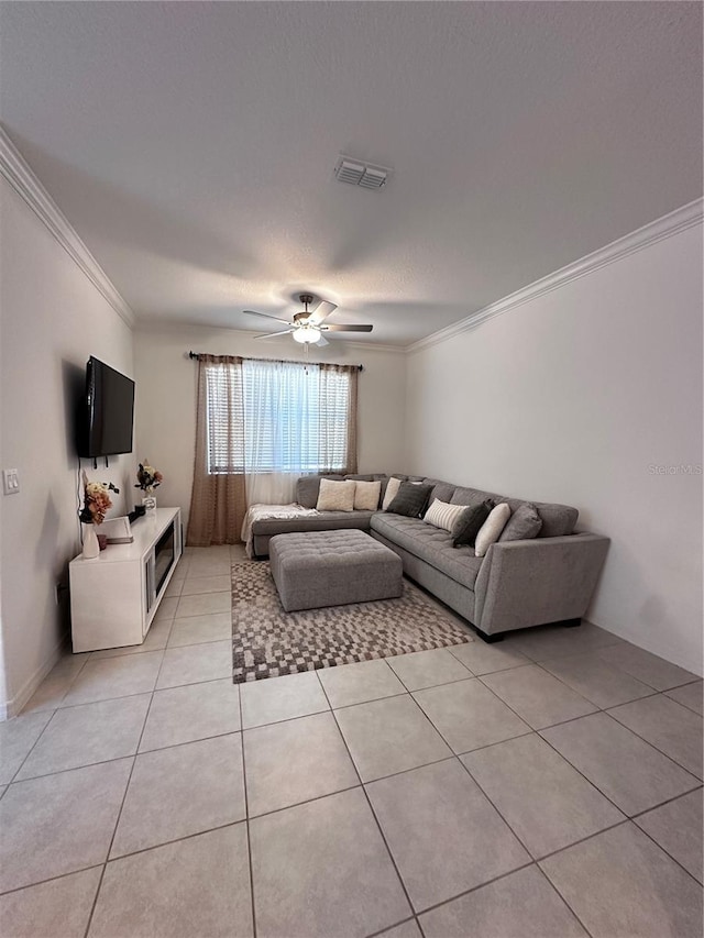 6942 Ripple Pond Loop, Zephyrhills, FL 33541 - living area featuring crown molding, a ceiling fan, visible vents, and light tile patterned floors