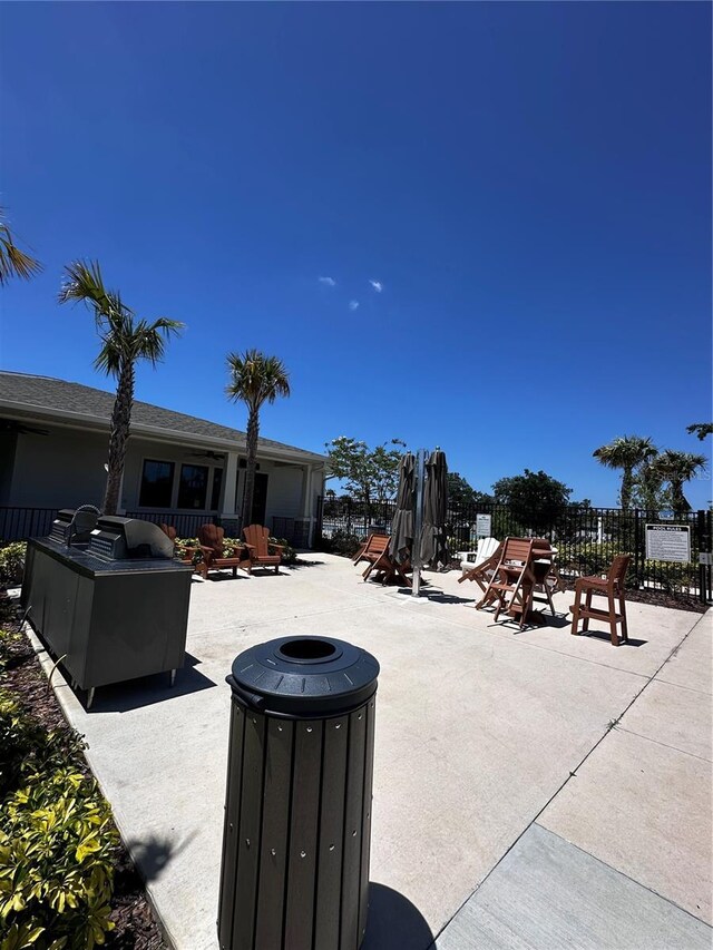 6942 Ripple Pond Loop, Zephyrhills, FL 33541 - view of patio featuring fence