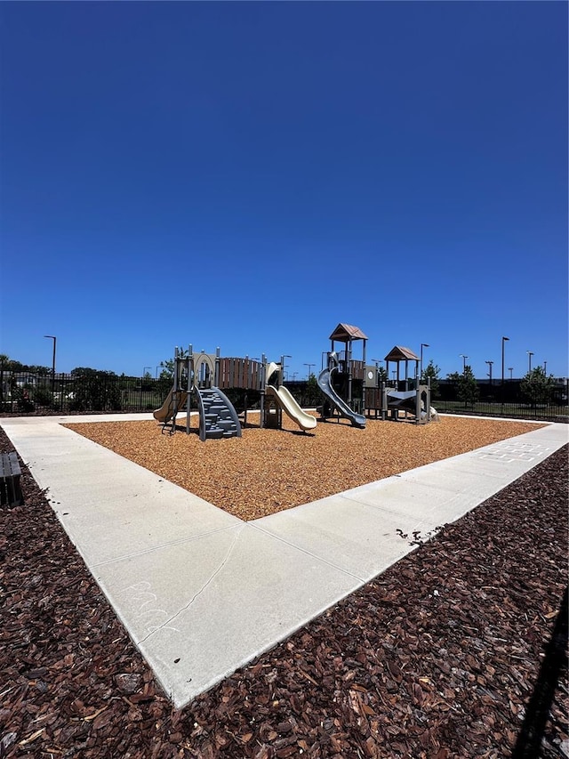 6942 Ripple Pond Loop, Zephyrhills, FL 33541 - communal playground with fence