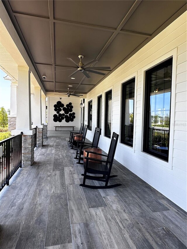 6942 Ripple Pond Loop, Zephyrhills, FL 33541 - wooden terrace featuring a ceiling fan