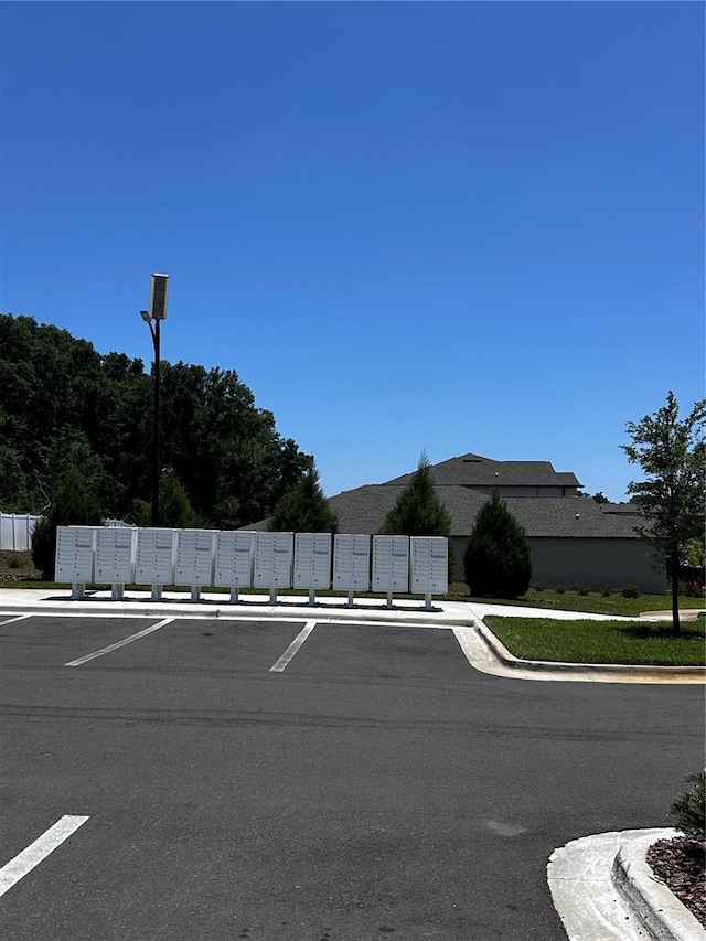 6942 Ripple Pond Loop, Zephyrhills, FL 33541 - uncovered parking lot with mail area