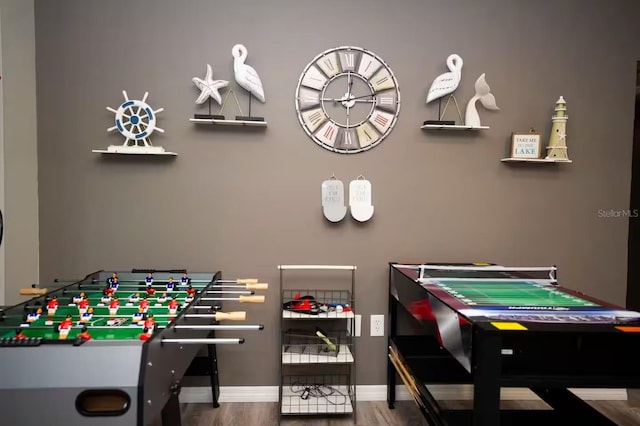 2460 Beacon Groves Blvd, Palm Harbor, FL 34683 - playroom featuring baseboards and wood finished floors