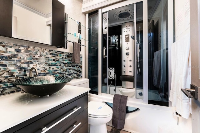 2460 Beacon Groves Blvd, Palm Harbor, FL 34683 - full bath with combined bath / shower with glass door, vanity, backsplash, and toilet