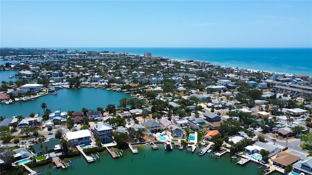 birds eye view of property featuring a residential view and a water view