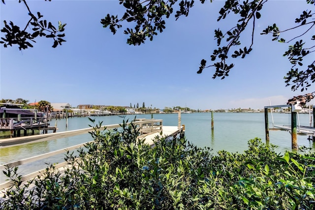 view of dock featuring a water view and boat lift