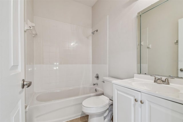 bathroom with toilet,  shower combination, and vanity