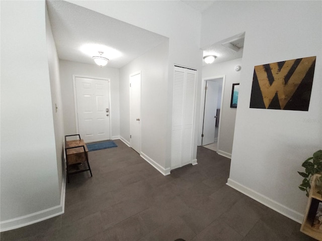 interior space featuring baseboards
