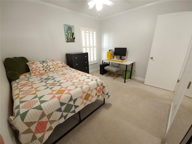 bedroom featuring baseboards, ornamental molding, ceiling fan, and light carpet