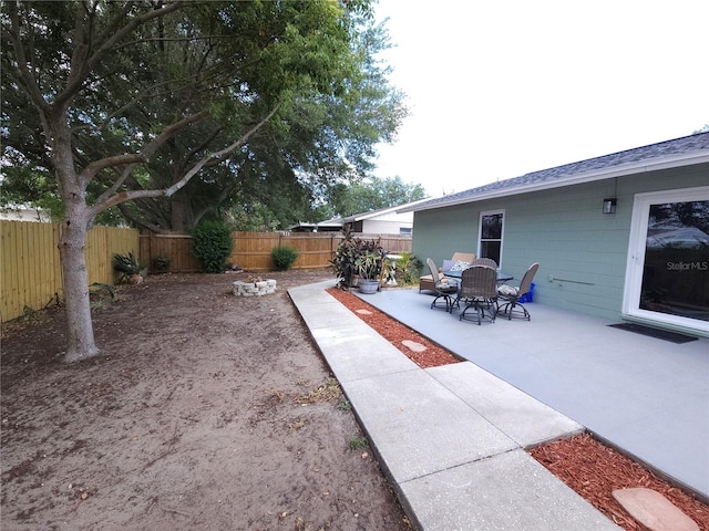 view of yard featuring a fenced backyard and a patio