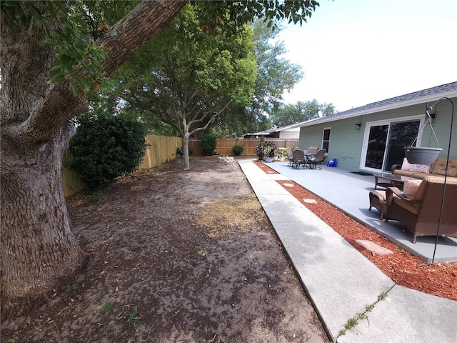 view of yard featuring a fenced backyard and a patio area