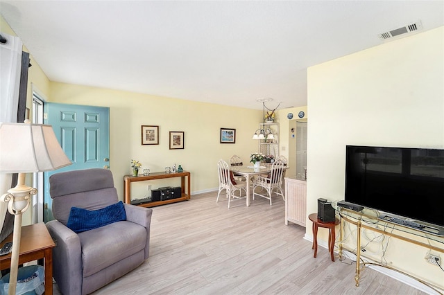 5216 81st St N Unit 2, Saint Petersburg, FL 33709 - living room with light wood finished floors and baseboards