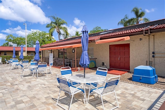 view of patio with outdoor dining area