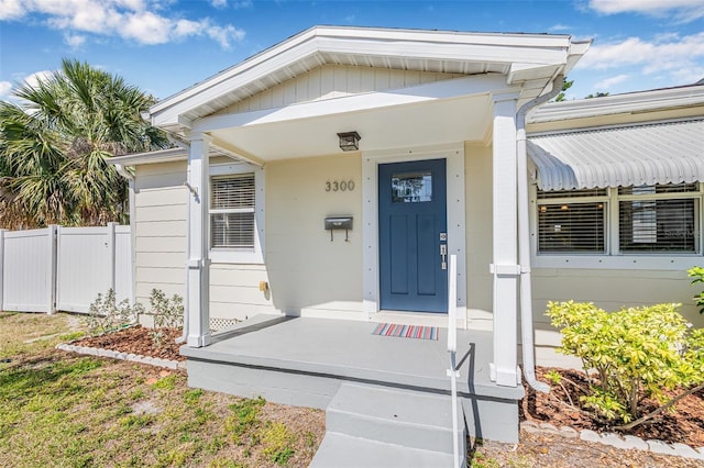 3300 Jackson St N, Saint Petersburg, FL 33704 - doorway to property featuring fence