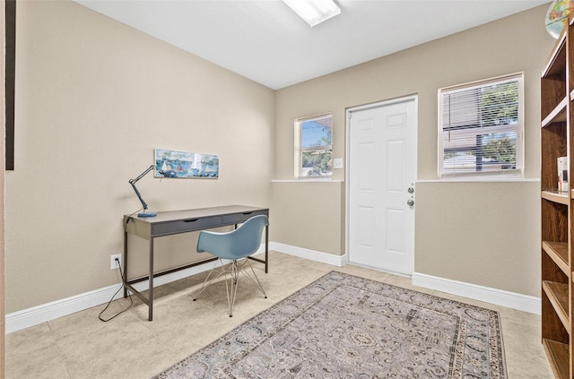 3300 Jackson St N, Saint Petersburg, FL 33704 - foyer featuring baseboards and plenty of natural light